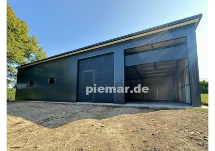blechgarage_garage_mit_dachneigung_nach_hinten_konstruktion_aus_verzinkten_vierkantprofilen_3x_fenster_2x_sektionaltor_elektroan_17_524341721_1543309006