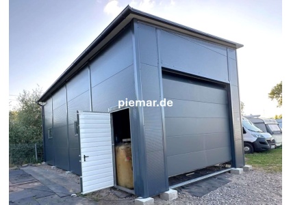 garage-10-x-5-x-45-m-in-farbe-sektionaltor-tuer-fenster-dachrinne-kantenschutz-attika-konstruktion-aus-verzinkten-vierkantprofilen-verankerung-isolation-aufbau_3