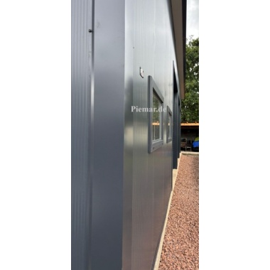 blechgarage-14x6x4m-dachneigung-nach-hinten-sektionaltor-elektroantrieb-1x-schlupftuer-sektionaltor-tuer-fenster-dachrinne-attika-dachblende-kantenschutz-konstruktion-aus-verzinkten-vierkantprofilen-verankerung-isolation_14_432152046