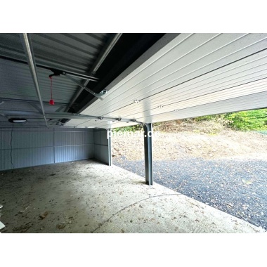 blechgarage-2xsektionaltor-dachrinne-kantenschutz-attika-konstruktion-aus-verzinkten-vierkantprofilen-in-farbe_2