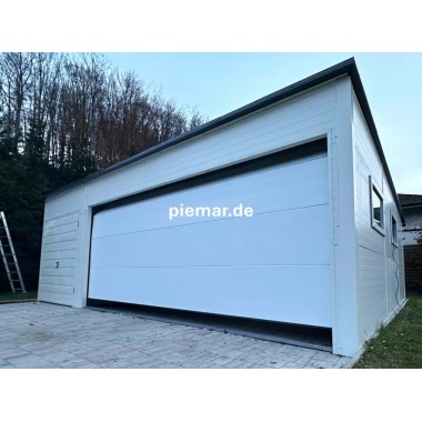 blechgarage-halle-lager-garage-mit-einer-dachneigung-nach-hinten-1x-doppelfluegeltor-3x-fenster-1x-sektionaltor-inkl-elektroantrieb-dachrinne-kondensvlies-dach-attika-dachblende-kantenschutz-konstruktion-aus-verzinkten_10