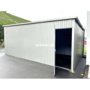 blechgarage-mit-schwingtor-elektroantrieb-tuer-1x-fenster-attika-kantenschutz-konstruktion-aus-verzinkten-vierkantprofilen-in-holzdekofarbe_6