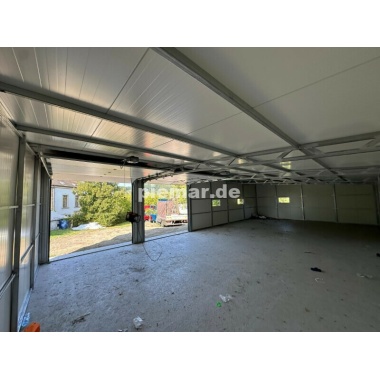 blechgarage_garage_mit_dachneigung_nach_hinten_konstruktion_aus_verzinkten_vierkantprofilen_3x_fenster_2x_sektionaltor_elektroan_14_2026004298