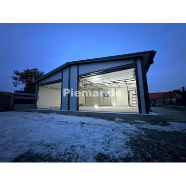 blechgarage_halle_isolation_attika_1x_tur__3x_fenster__2x_sektionaltor_kantenschutz_verankerung__dachrinne_lager_10