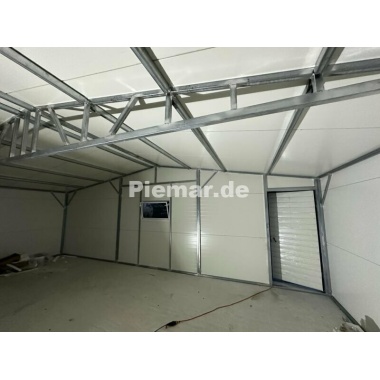 blechgarage_halle_isolation_attika_1x_tur__3x_fenster__2x_sektionaltor_kantenschutz_verankerung__dachrinne_lager_11
