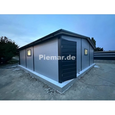blechgarage_halle_isolation_attika_1x_tur__3x_fenster__2x_sektionaltor_kantenschutz_verankerung__dachrinne_lager_4