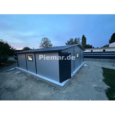 blechgarage_halle_isolation_attika_1x_tur__3x_fenster__2x_sektionaltor_kantenschutz_verankerung__dachrinne_lager_6