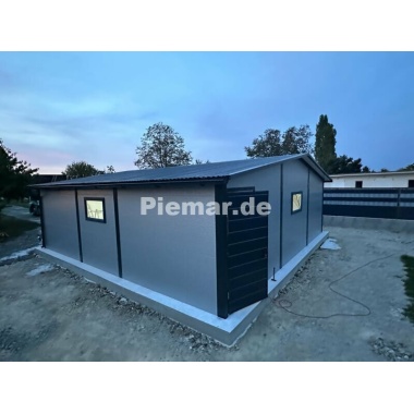 blechgarage_halle_isolation_attika_1x_tur__3x_fenster__2x_sektionaltor_kantenschutz_verankerung__dachrinne_lager_7