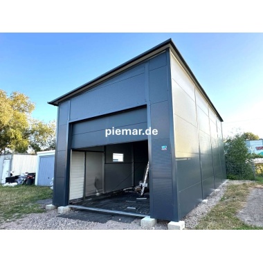 garage-10-x-5-x-45-m-in-farbe-sektionaltor-tuer-fenster-dachrinne-kantenschutz-attika-konstruktion-aus-verzinkten-vierkantprofilen-verankerung-isolation-aufbau_7