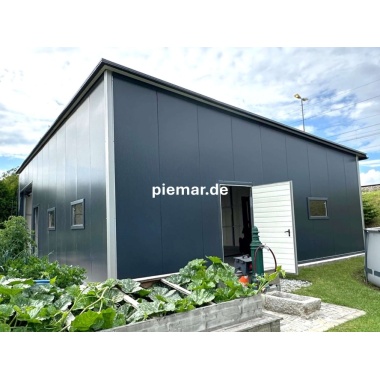 garage-12x9x410-m-mit-einer-dachneigung-nach-hinten-1x-sektionaltor-inkl-elektroantrieb-3x-fenster-2x-tuer-attika-dachblende-kantenschutz-dachrinne-in-farbe-konstruktion-aus-verzinkten-vierkantprofilen-isolation-statik_4