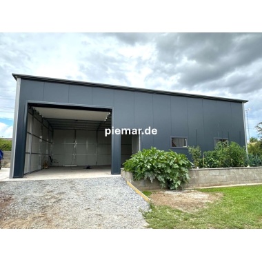 garage-12x9x410-m-mit-einer-dachneigung-nach-hinten-1x-sektionaltor-inkl-elektroantrieb-3x-fenster-2x-tuer-attika-dachblende-kantenschutz-dachrinne-in-farbe-konstruktion-aus-verzinkten-vierkantprofilen-isolation-statik_6