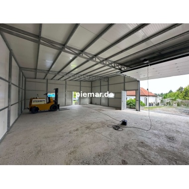 garage-12x9x410-m-mit-einer-dachneigung-nach-hinten-1x-sektionaltor-inkl-elektroantrieb-3x-fenster-2x-tuer-attika-dachblende-kantenschutz-dachrinne-in-farbe-konstruktion-aus-verzinkten-vierkantprofilen-isolation-statik_9