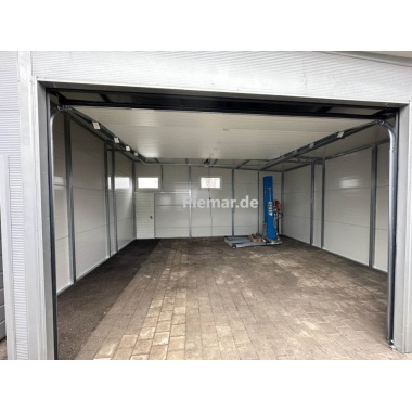 garage-7x6x35m-dachneigung-rechts-2x-tuer-sektionaltor-fenster-dachrinne-kantenschutz-verankerung-konstruktion-aus-verzinkten-vierkantprofilen-bleche-horizontal-vernietet-isolation-27364_8