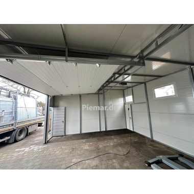 garage-7x6x35m-dachneigung-rechts-2x-tuer-sektionaltor-fenster-dachrinne-kantenschutz-verankerung-konstruktion-aus-verzinkten-vierkantprofilen-bleche-horizontal-vernietet-isolation-27364_9